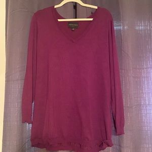 Purple sweater. Very good condition.